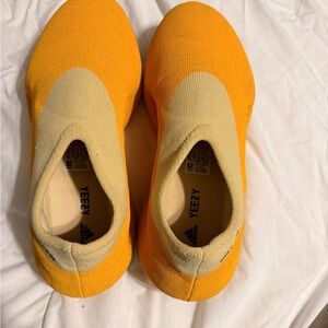 Yeezy Vibrant Orange and Cream Sneakers